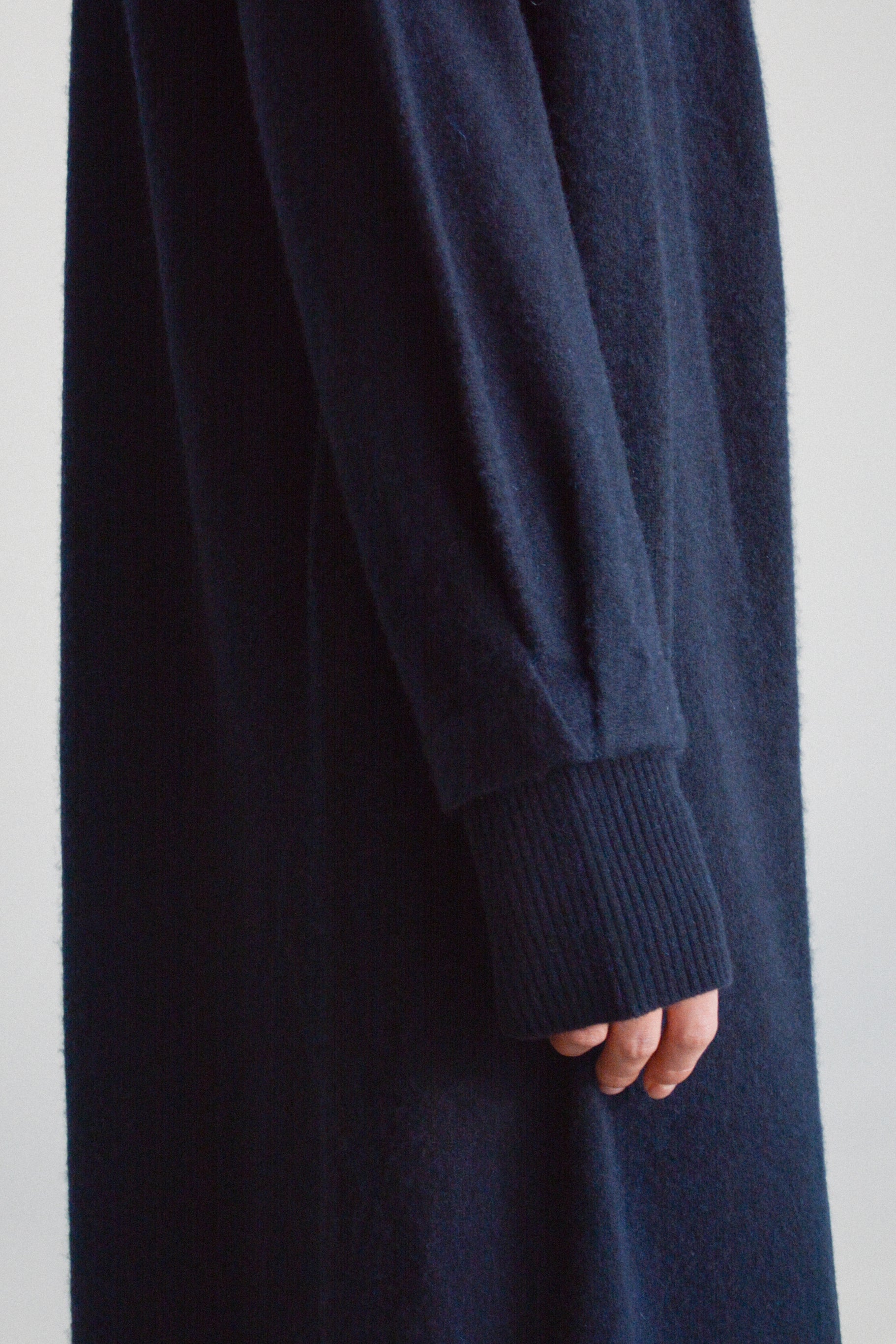 Pleat detail and ribbed cuffs