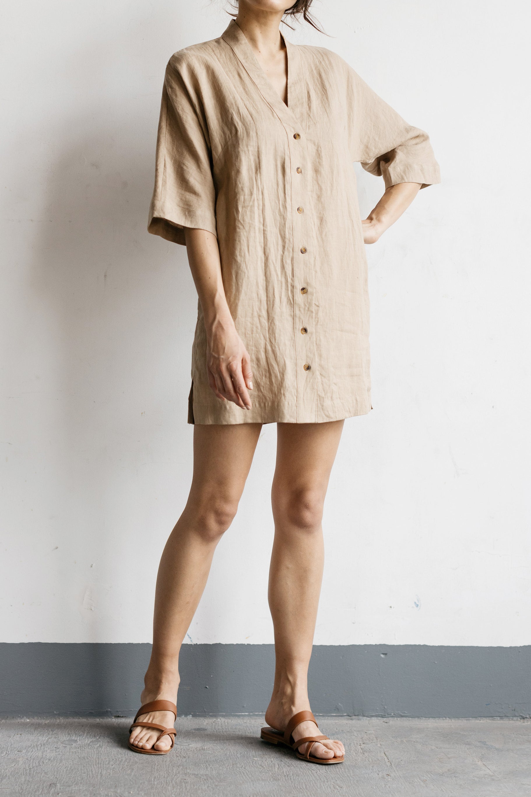 Shirtdress length hits at mid-thigh